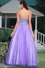 Robe de bal lilas style princesse décolleté coeur en perles