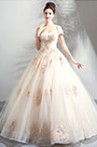 Vestido de fiesta de tul beige con hombros descubiertos